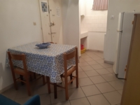 soggiorno con angolo cottura